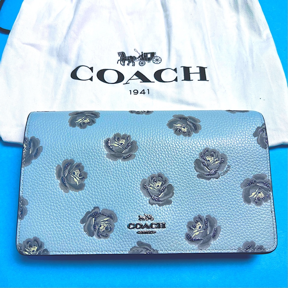 Coach sky blue glitter flower crossbody bag.